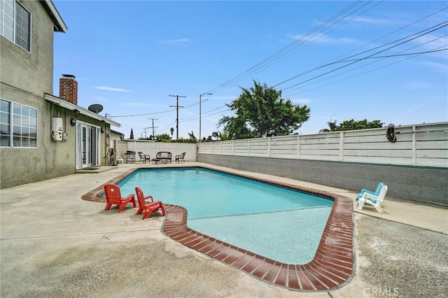 1523 Lynton Ave, Wilmington, CA 90744 - view of pool with a patio area and a fenced backyard