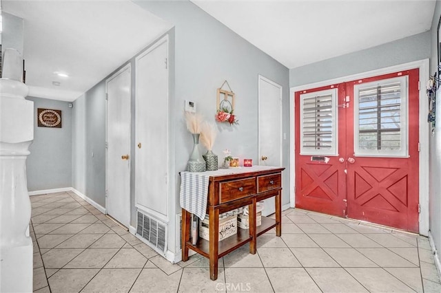 1523 Lynton Ave, Wilmington, CA 90744 - foyer featuring light tile patterned flooring, baseboards, and recessed lighting