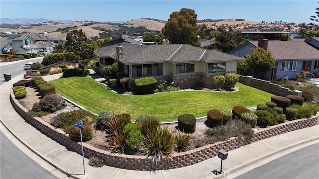 250 Coral Ct, Pismo Beach, CA 93449 - ranch-style home featuring a front lawn, a chimney, a residential view, and a mountain view