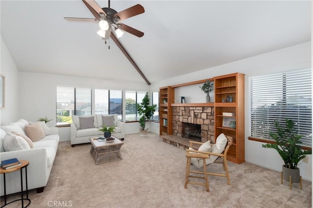 250 Coral Ct, Pismo Beach, CA 93449 - living room featuring ceiling fan, carpet, and a stone fireplace