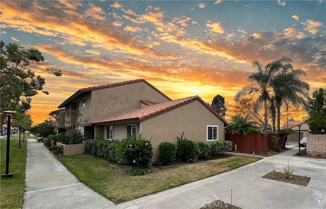 10546 Royal Oak Way, Stanton, CA 90680 - view of property exterior with a tiled roof and stucco siding