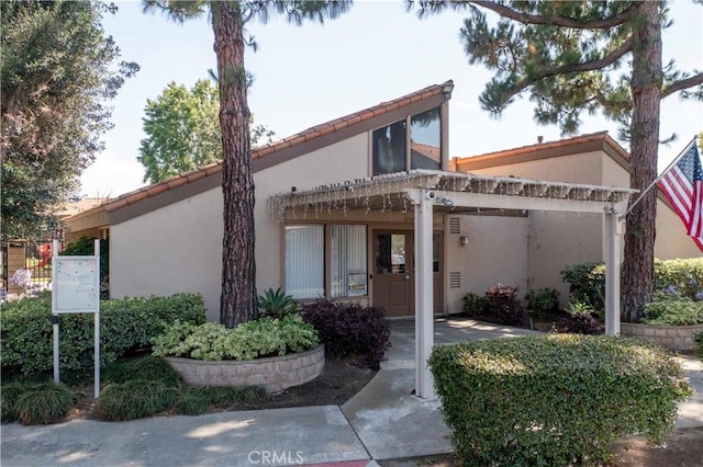 10546 Royal Oak Way, Stanton, CA 90680 - view of front facade featuring stucco siding and a tiled roof
