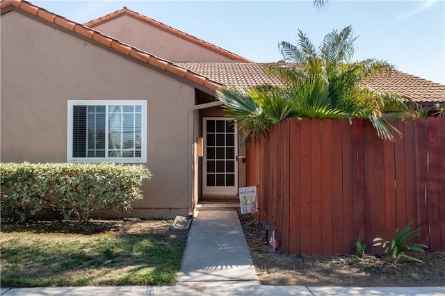 10546 Royal Oak Way, Stanton, CA 90680 - entrance to property featuring a tile roof and stucco siding