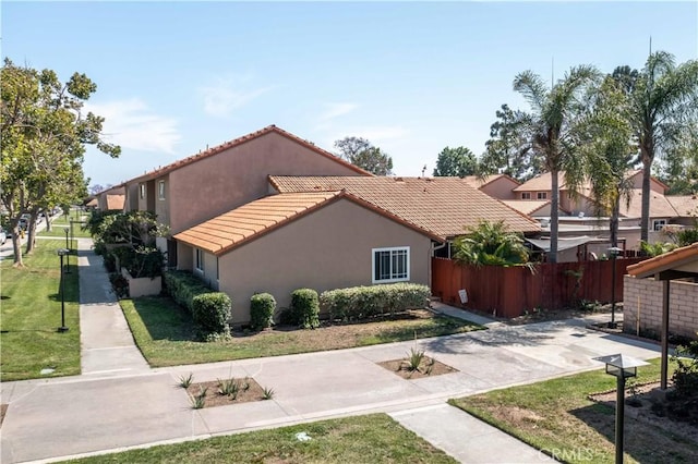 10546 Royal Oak Way, Stanton, CA 90680 - view of front of house featuring a tile roof and stucco siding