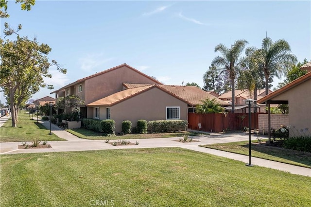 10546 Royal Oak Way, Stanton, CA 90680 - view of front facade with a tile roof and stucco siding