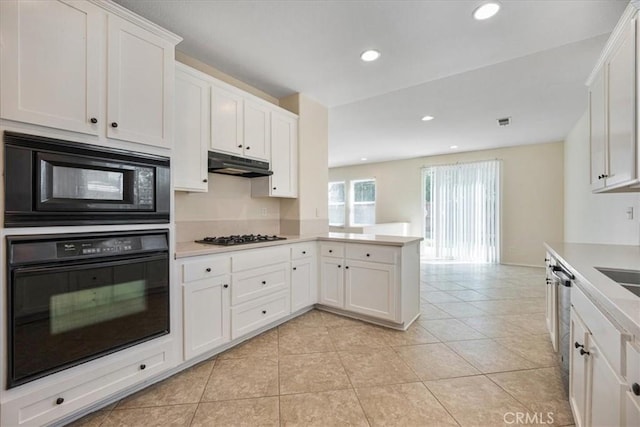 36340 Sicily Ln, Winchester, CA 92596 - kitchen featuring black appliances, under cabinet range hood, a peninsula, light countertops, and recessed lighting