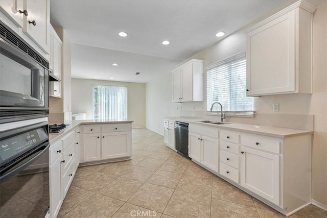 36340 Sicily Ln, Winchester, CA 92596 - kitchen featuring black appliances, light countertops, a peninsula, white cabinetry, and recessed lighting