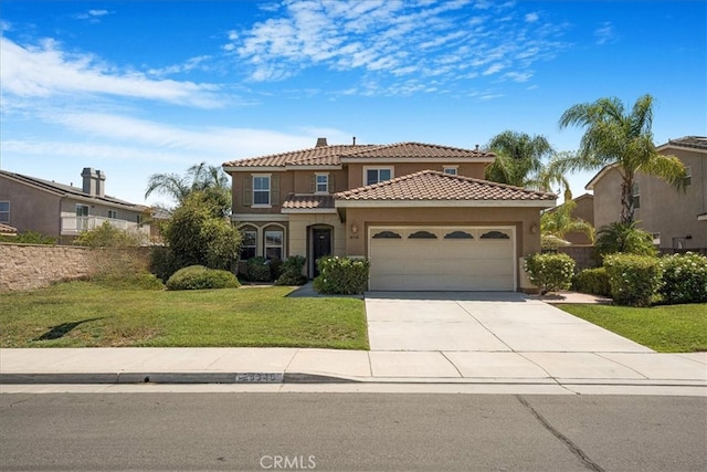36340 Sicily Ln, Winchester, CA 92596 - mediterranean / spanish house with a garage, a tile roof, driveway, stucco siding, and a front lawn