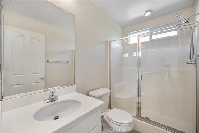 36340 Sicily Ln, Winchester, CA 92596 - bathroom featuring a stall shower, vanity, and a textured ceiling