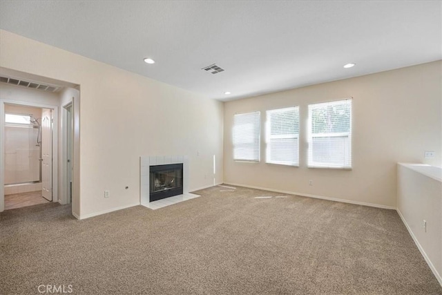 36340 Sicily Ln, Winchester, CA 92596 - unfurnished living room with carpet floors, a tiled fireplace, and recessed lighting