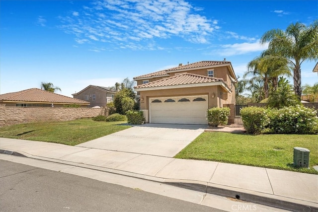 36340 Sicily Ln, Winchester, CA 92596 - mediterranean / spanish house featuring a garage, concrete driveway, a tile roof, and stucco siding