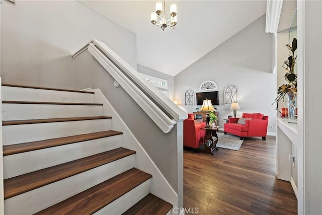 9081 Mandarin Ln, Riverside, CA 92508 - stairs with wood finished floors, a chandelier, and vaulted ceiling