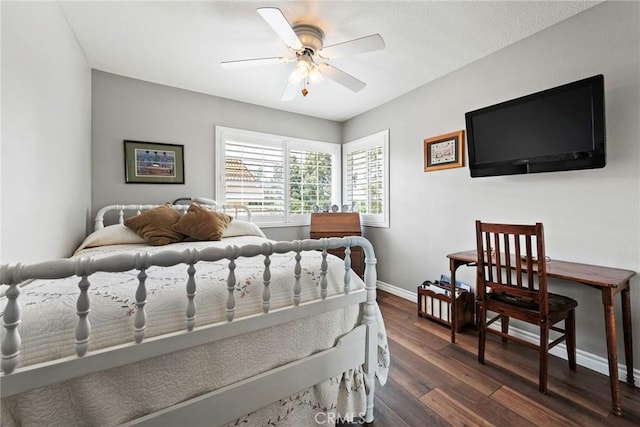 9081 Mandarin Ln, Riverside, CA 92508 - bedroom featuring dark wood finished floors, baseboards, and ceiling fan