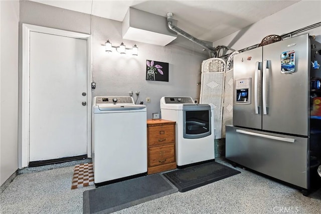9081 Mandarin Ln, Riverside, CA 92508 - laundry room with washing machine and clothes dryer