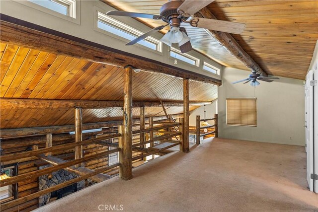 30771 Fox Ridge Ct, Tehachapi, CA 93561 - corridor with wood ceiling with exposed beams, carpet, and healthy amount of natural light