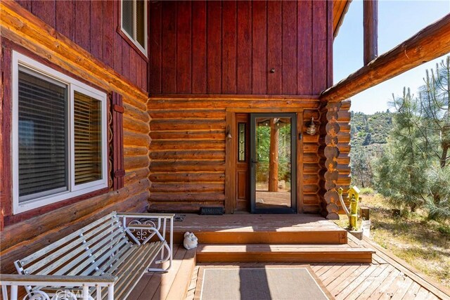 30771 Fox Ridge Ct, Tehachapi, CA 93561 - entrance to property with a wooden deck and log exterior