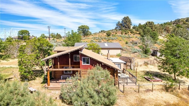 30771 Fox Ridge Ct, Tehachapi, CA 93561 - back of house featuring log siding and a deck