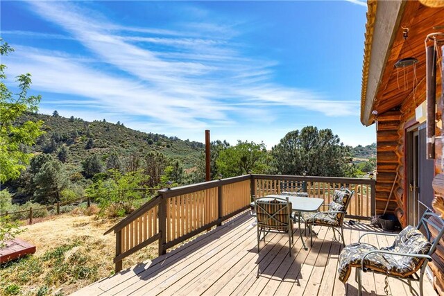 30771 Fox Ridge Ct, Tehachapi, CA 93561 - deck featuring outdoor dining space and a view of trees