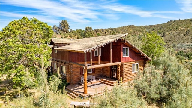 30771 Fox Ridge Ct, Tehachapi, CA 93561 - rear view of property with log exterior and a deck with mountain view