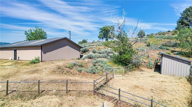 30771 Fox Ridge Ct, Tehachapi, CA 93561 - view of yard featuring an outdoor structure and an outbuilding