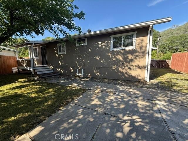 2911 Rancho Vista Dr, Lucerne, CA 95458 - rear view of property with a patio area