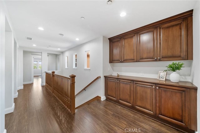 15 Basilica Pl, Ladera Ranch, CA 92694 - bar area with dark wood-type flooring, baseboards, and recessed lighting