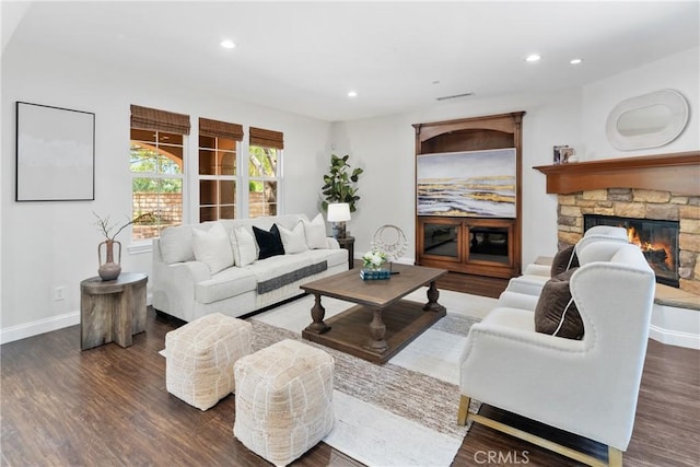 15 Basilica Pl, Ladera Ranch, CA 92694 - living area with wood finished floors, recessed lighting, baseboards, and a fireplace