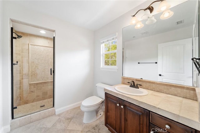 15 Basilica Pl, Ladera Ranch, CA 92694 - bathroom featuring baseboards, vanity, a stall shower, and toilet