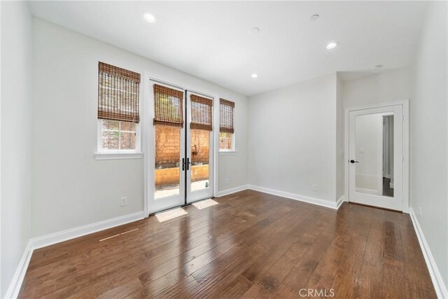 15 Basilica Pl, Ladera Ranch, CA 92694 - unfurnished room with french doors, dark wood-type flooring, baseboards, and recessed lighting