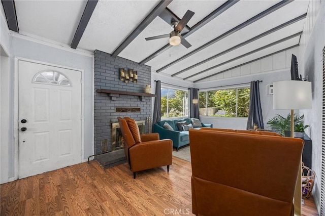 4201 Irvon Trl, Frazier Park, CA 93225 - living room with a ceiling fan, wood finished floors, and a brick fireplace