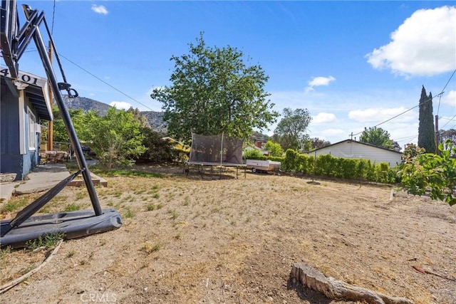 4201 Irvon Trl, Frazier Park, CA 93225 - view of yard featuring a trampoline and a mountain view