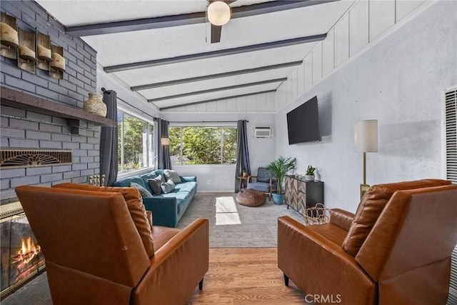 4201 Irvon Trl, Frazier Park, CA 93225 - living room featuring a brick fireplace and wood finished floors