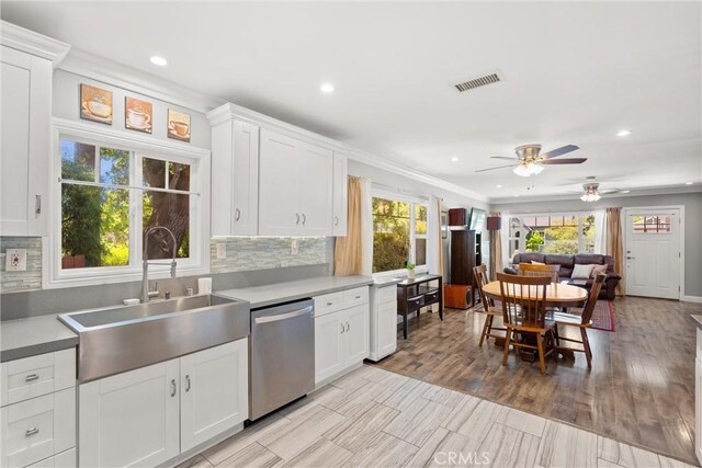 234 N Alta Vista Ave, Monrovia, CA 91016 - kitchen with stainless steel dishwasher, recessed lighting, a ceiling fan, white cabinetry, and backsplash