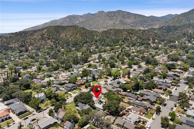 234 N Alta Vista Ave, Monrovia, CA 91016 - aerial overview of property's location featuring a mountain backdrop and nearby suburban area