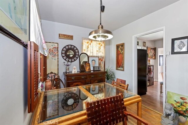 112 W Grandview Dr, Barstow, CA 92311 - dining room with wood finished floors