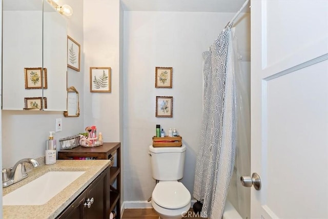 112 W Grandview Dr, Barstow, CA 92311 - full bath with vanity, toilet, shower / tub combo with curtain, and baseboards