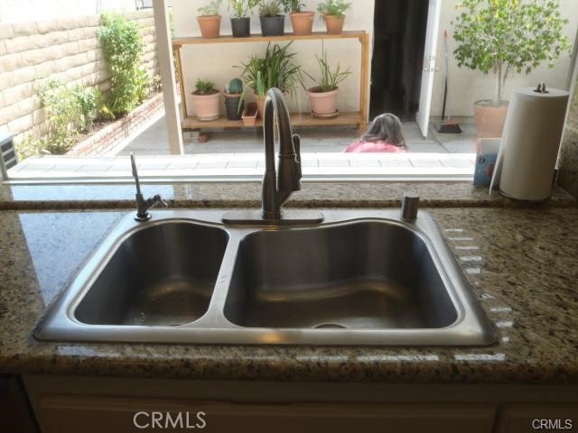 11459 Shippigan Way, Cypress, CA 90630 - kitchen view of a sink and stone countertops