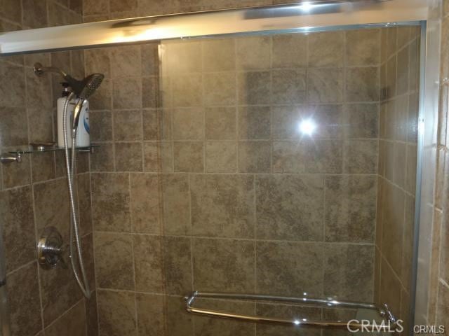 11459 Shippigan Way, Cypress, CA 90630 - bathroom featuring tiled shower