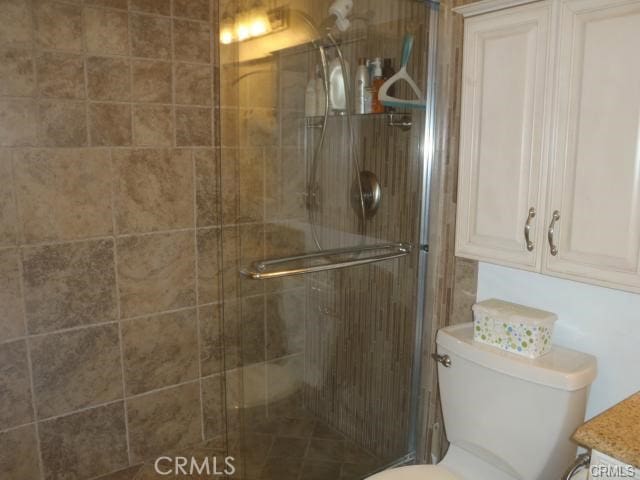 11459 Shippigan Way, Cypress, CA 90630 - bathroom with a shower stall, toilet, and vanity