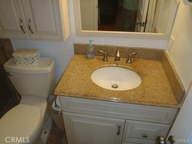 11459 Shippigan Way, Cypress, CA 90630 - half bathroom with vanity and toilet