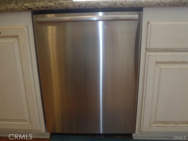 11459 Shippigan Way, Cypress, CA 90630 - kitchen view of dishwasher and light stone countertops