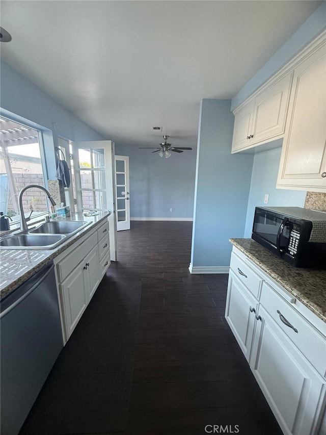 11459 Shippigan Way, Cypress, CA 90630 - kitchen with black microwave, dishwashing machine, a ceiling fan, white cabinets, and dark wood-style floors