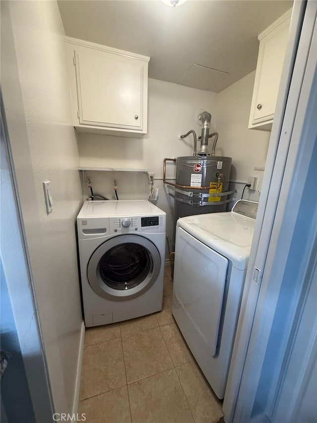 11459 Shippigan Way, Cypress, CA 90630 - washroom featuring washing machine and clothes dryer, secured water heater, cabinet space, and light tile patterned flooring