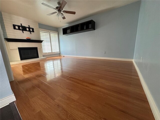 11459 Shippigan Way, Cypress, CA 90630 - unfurnished living room with a fireplace, wood finished floors, a ceiling fan, and lofted ceiling