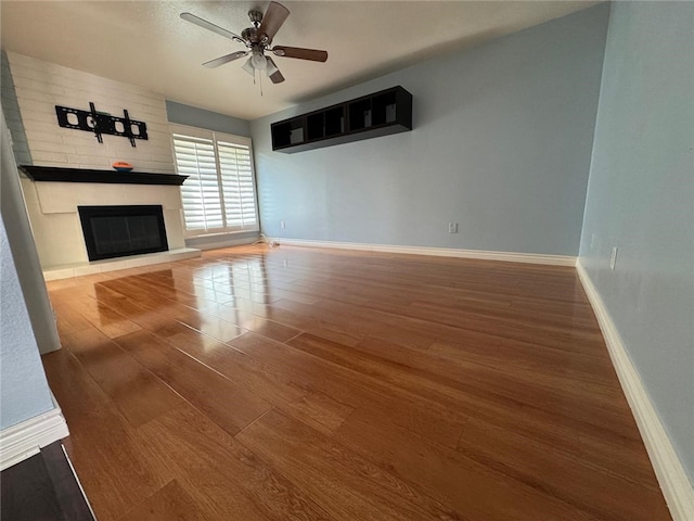 11459 Shippigan Way, Cypress, CA 90630 - unfurnished living room with a fireplace, wood finished floors, a ceiling fan, and lofted ceiling