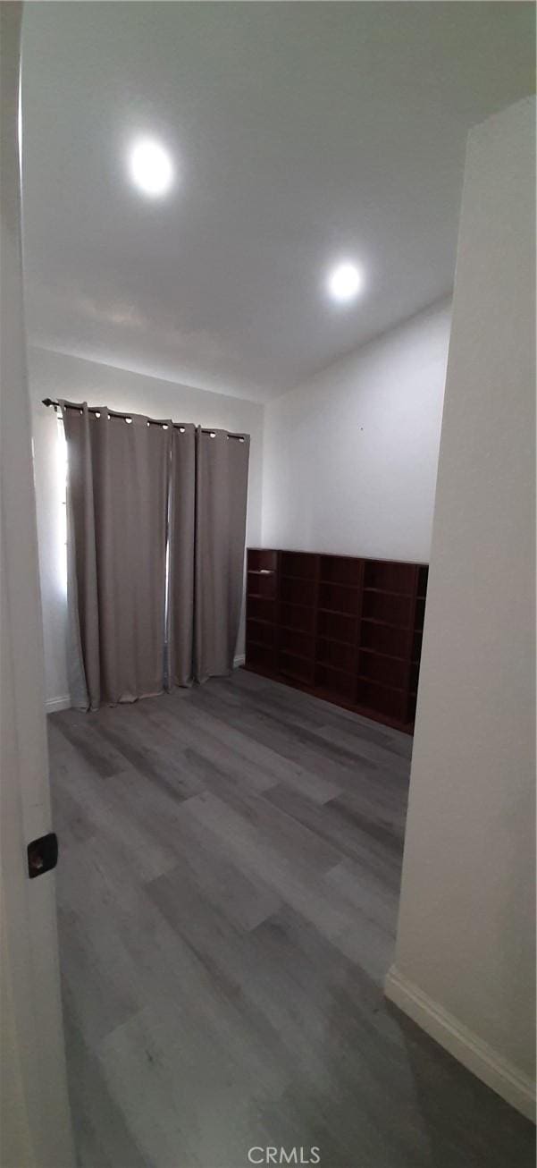 8814 Knollwood Pl, Rancho Cucamonga, CA 91730 - spare room featuring recessed lighting and wood finished floors