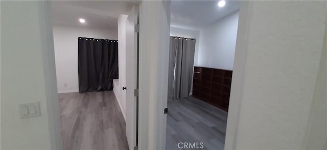 8814 Knollwood Pl, Rancho Cucamonga, CA 91730 - hallway with wood finished floors and recessed lighting