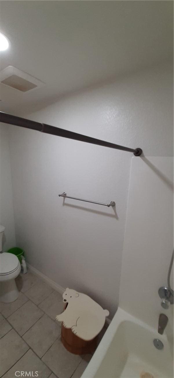 8814 Knollwood Pl, Rancho Cucamonga, CA 91730 - bathroom with toilet, tile patterned flooring, and  shower combination