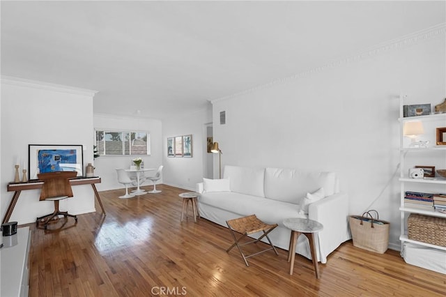 1330 N Crescent Heights Blvd Unit 12, West Hollywood, CA 90046 - living room with wood finished floors and ornamental molding