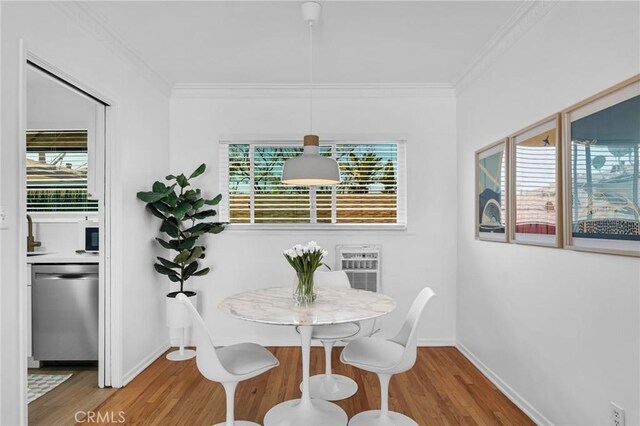 1330 N Crescent Heights Blvd Unit 12, West Hollywood, CA 90046 - dining space featuring wood finished floors, ornamental molding, and baseboards